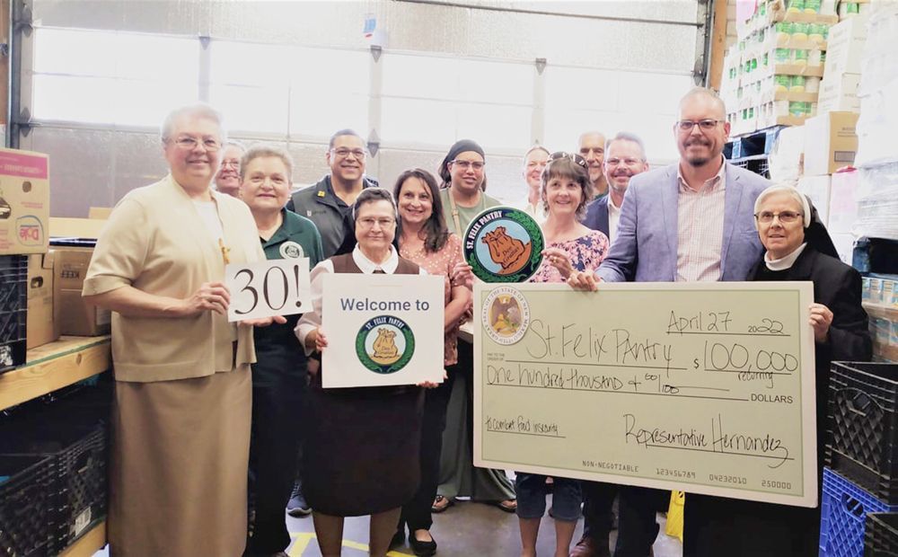 New Mexico State Rep. Joshua Hernandez presented St. Felix Pantry with a check for $100,000.