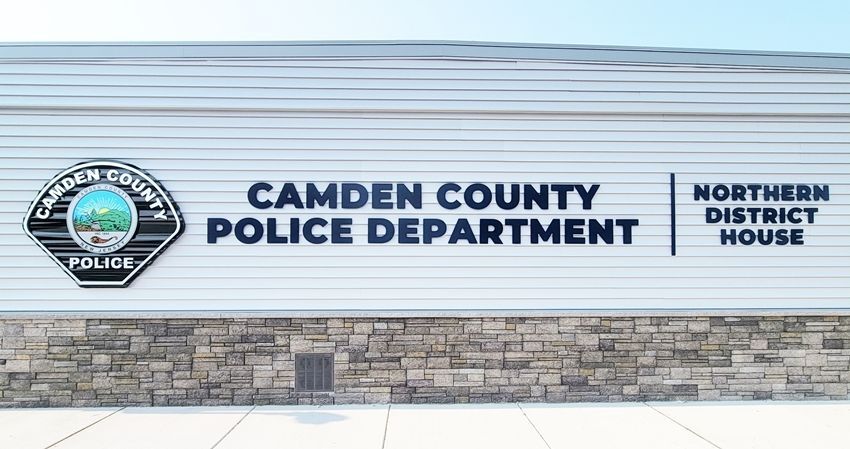 PP-2009 - Large Carved Plaque of the Shoulder Patch  of the Camden County Police Department and Text Mounted on the Outside Wall of the Police Station