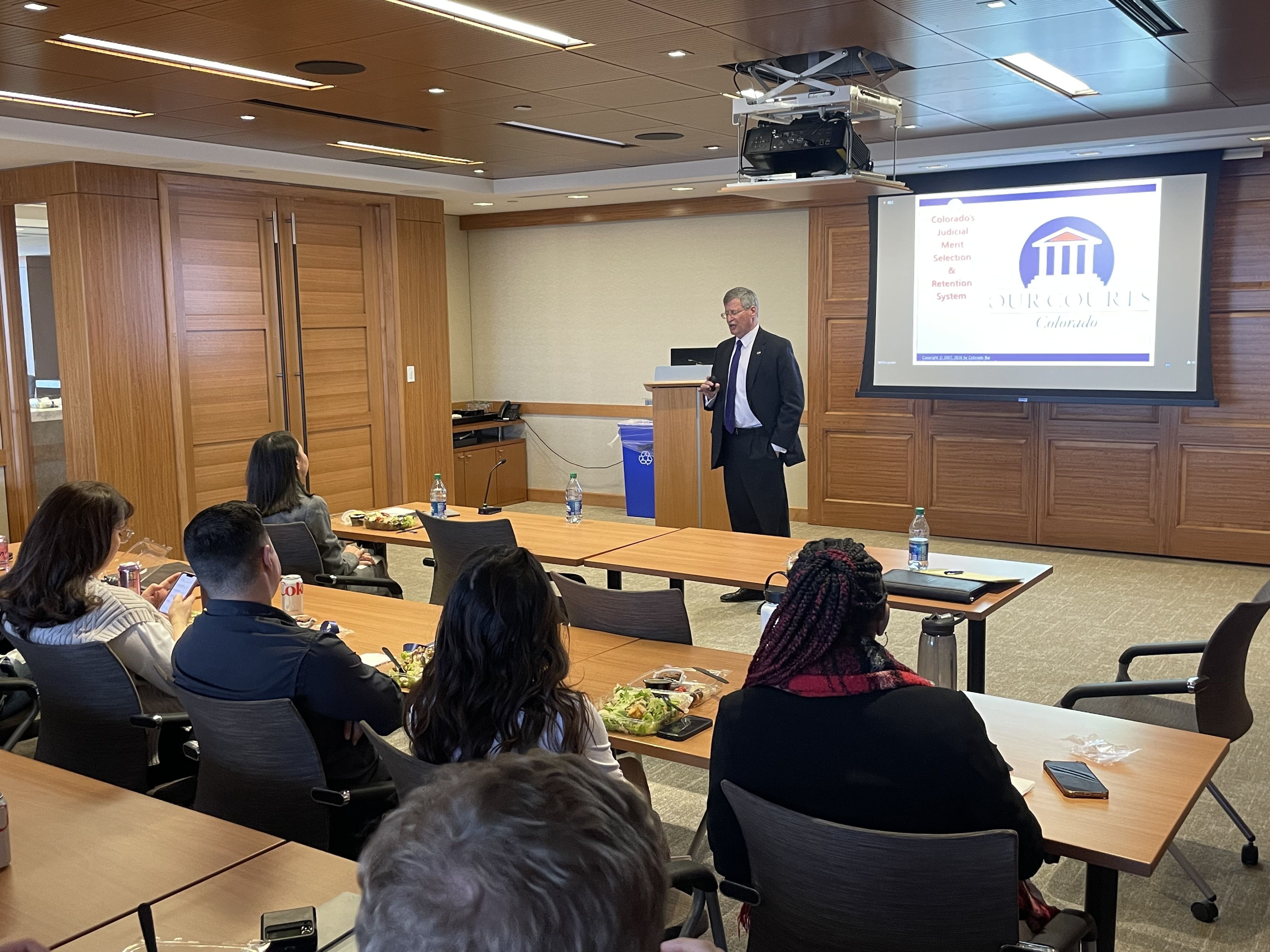 Justice Richard Gabriel speaks about judicial merit selection to an audience at the Wheeler Trigg O'Donnell law firm on November 2, 2022. 