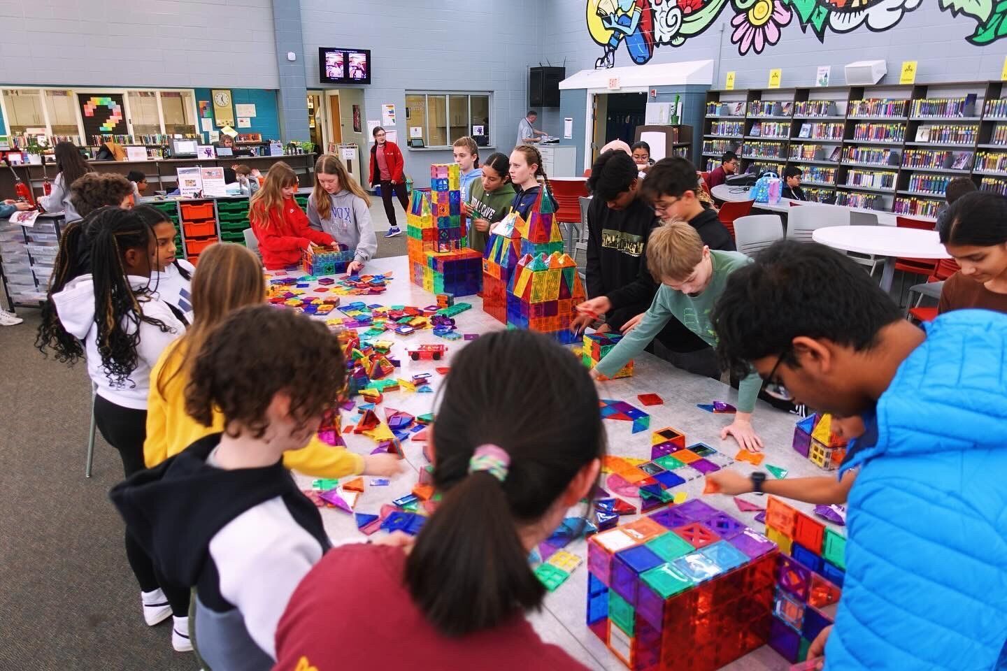 Kennedy Junior High students play with magnetic tiles.