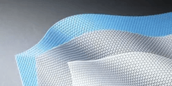 “Close-up of specialty laminating films with textured and embossed surfaces, designed to provide UV resistance, anti-graffiti protection, writable finishes, and decorative effects for signage, charts, and high-end presentations.
