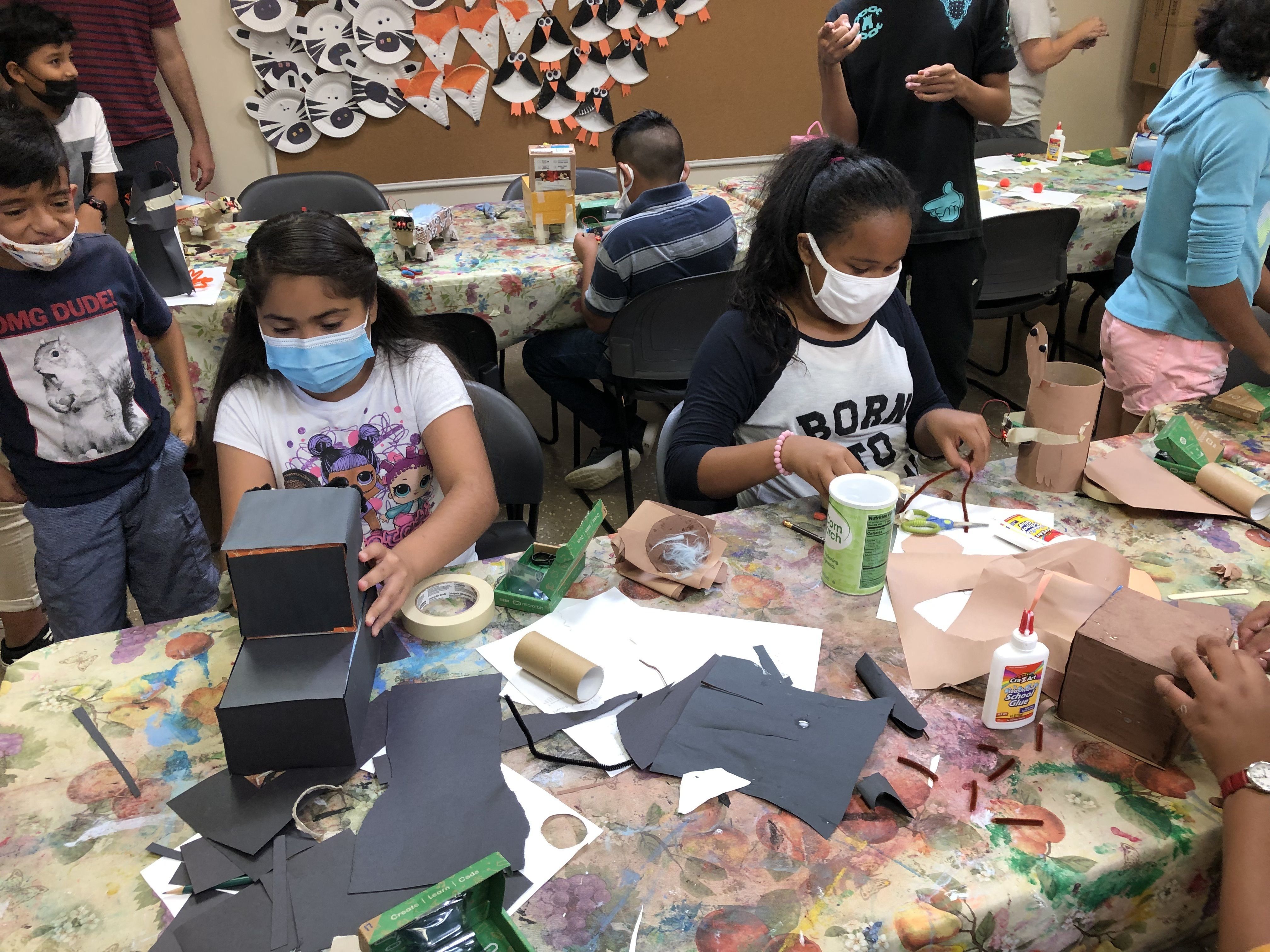 Children Building Robot Pets at Mooncrest STEM Camp