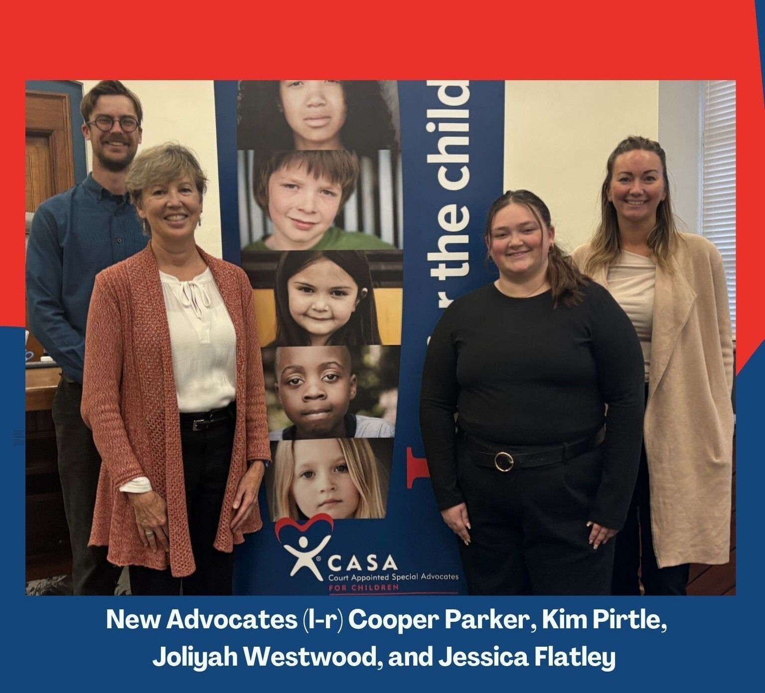 four new child advocates pose in courtroom