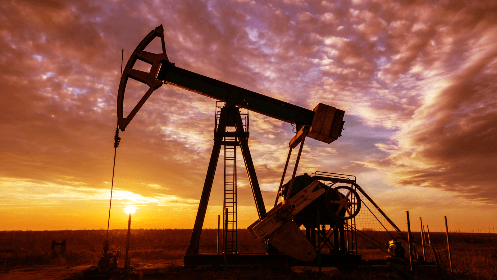 Oil well at dusk