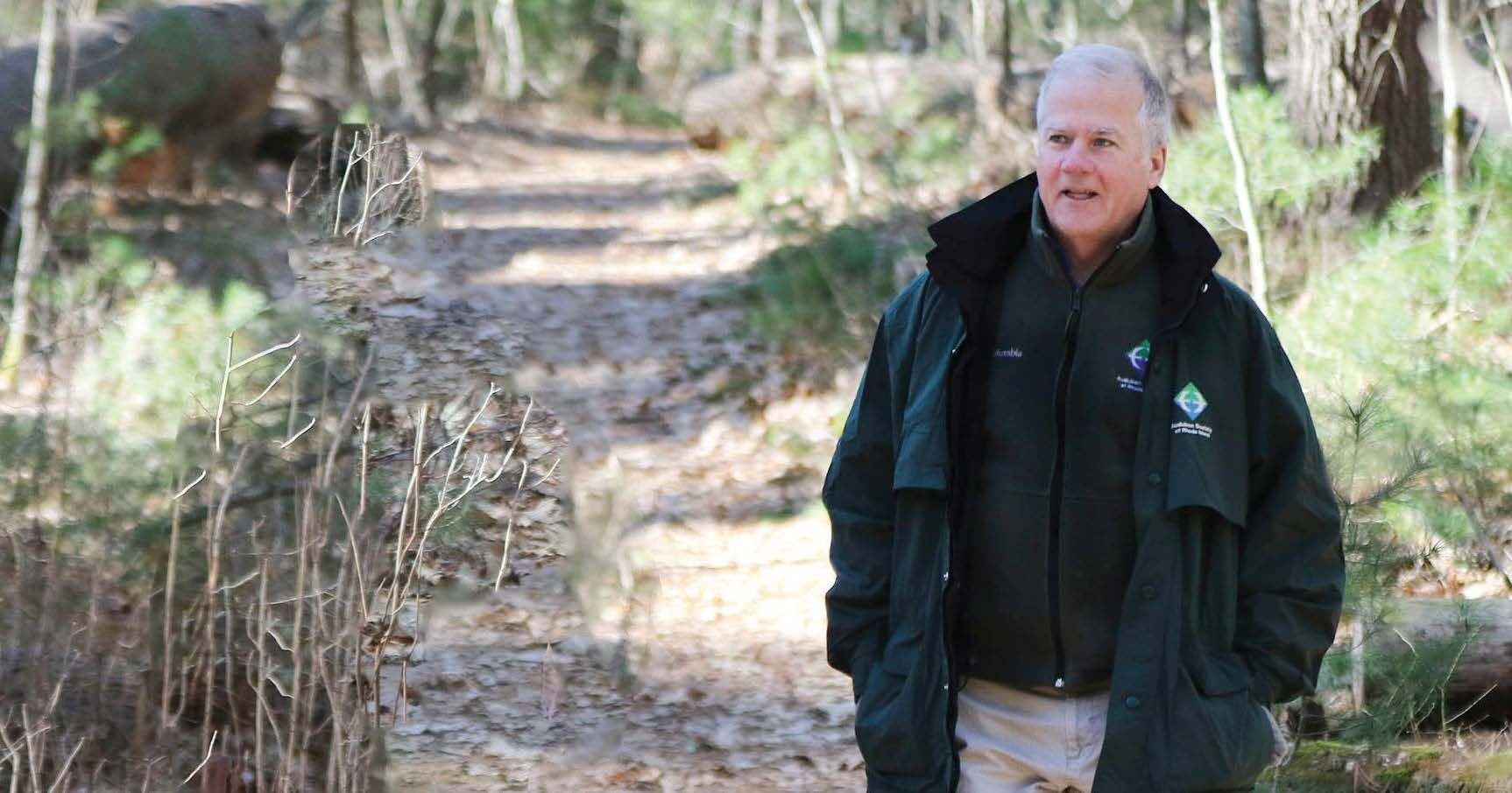 Larry Taft walking on an Audubon Fisherville Brook Wildlife Refuge trail