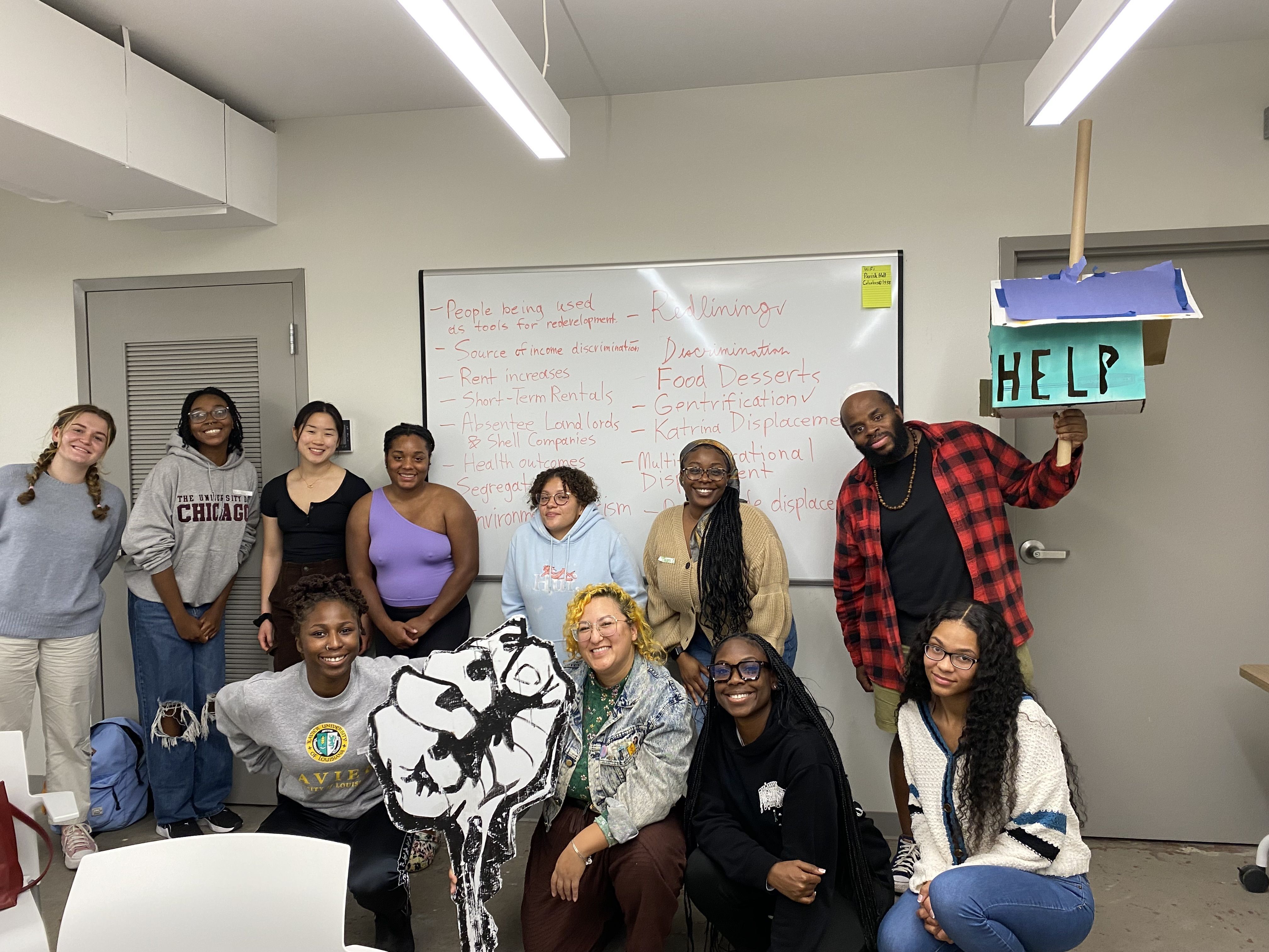 Jane Place staff and Renters Rights Assembly members pose for a photo.