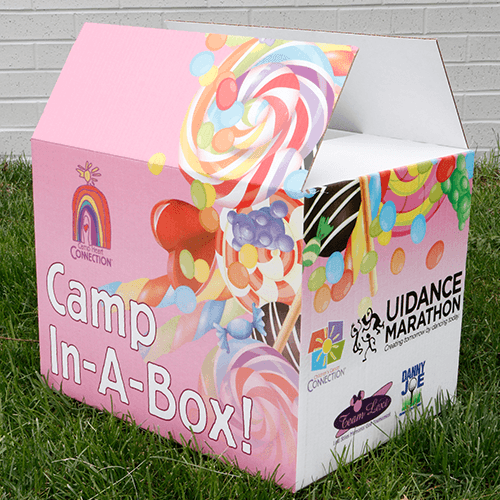 camp-in-a-box pink cardboard box with candy decor