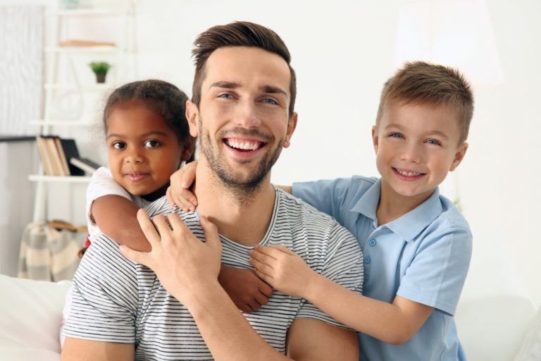 father with two foster children