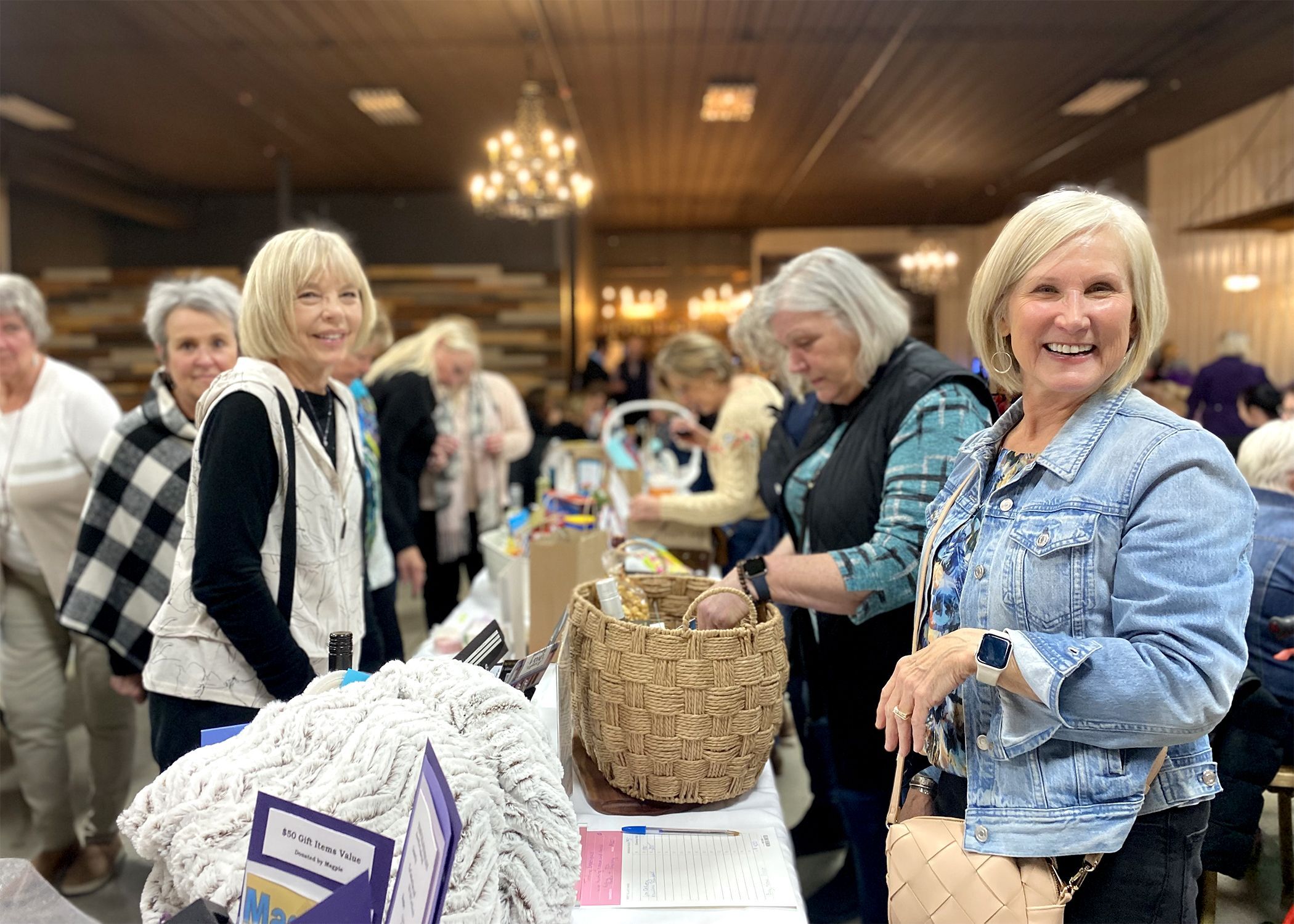 Women United and friends enjoy a girls night out! Shopping silent auction, playing Bingo and pledging membership to raise money to support Traveling Tree House and United Way Education Initiatives.  