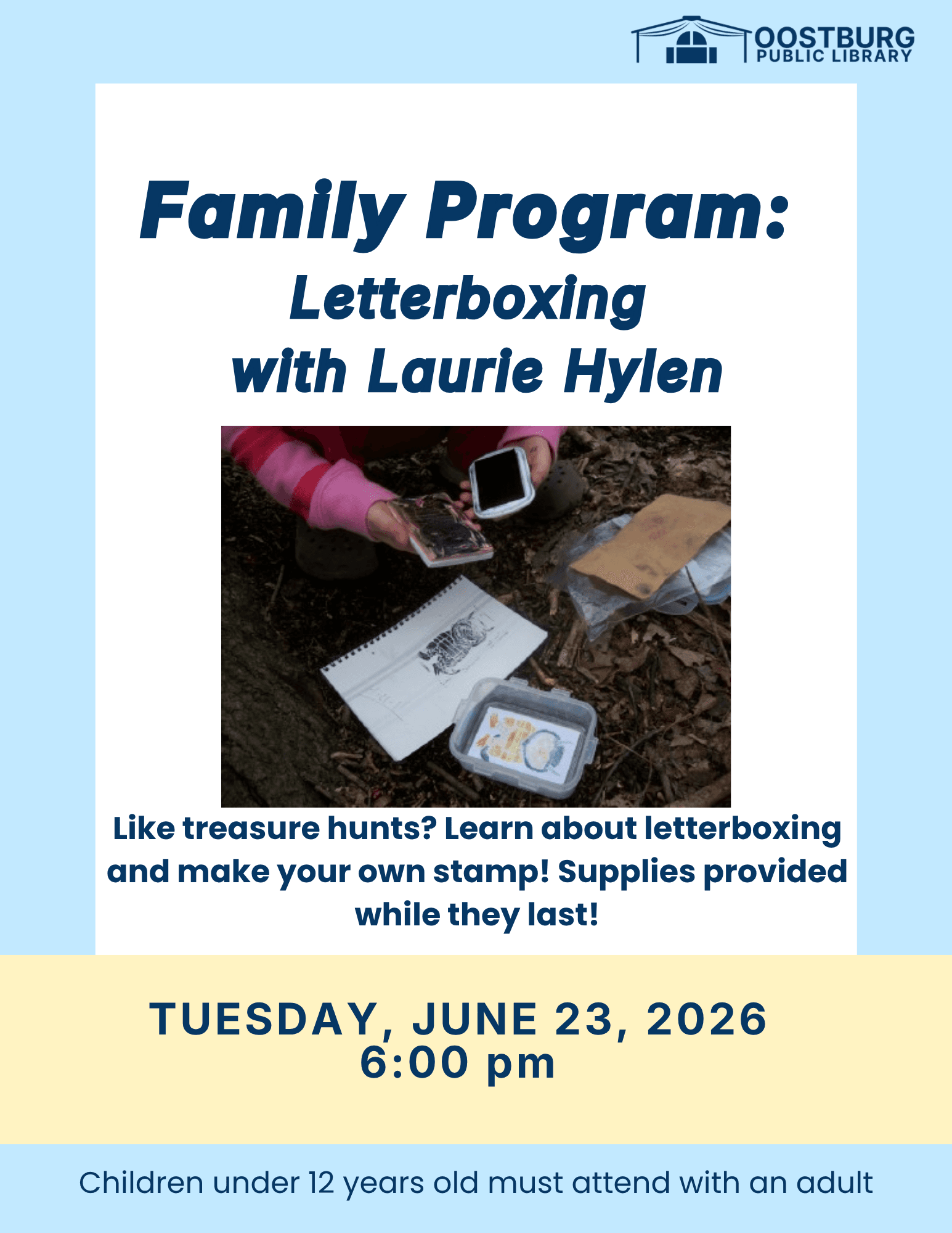hands stamping a book while outside