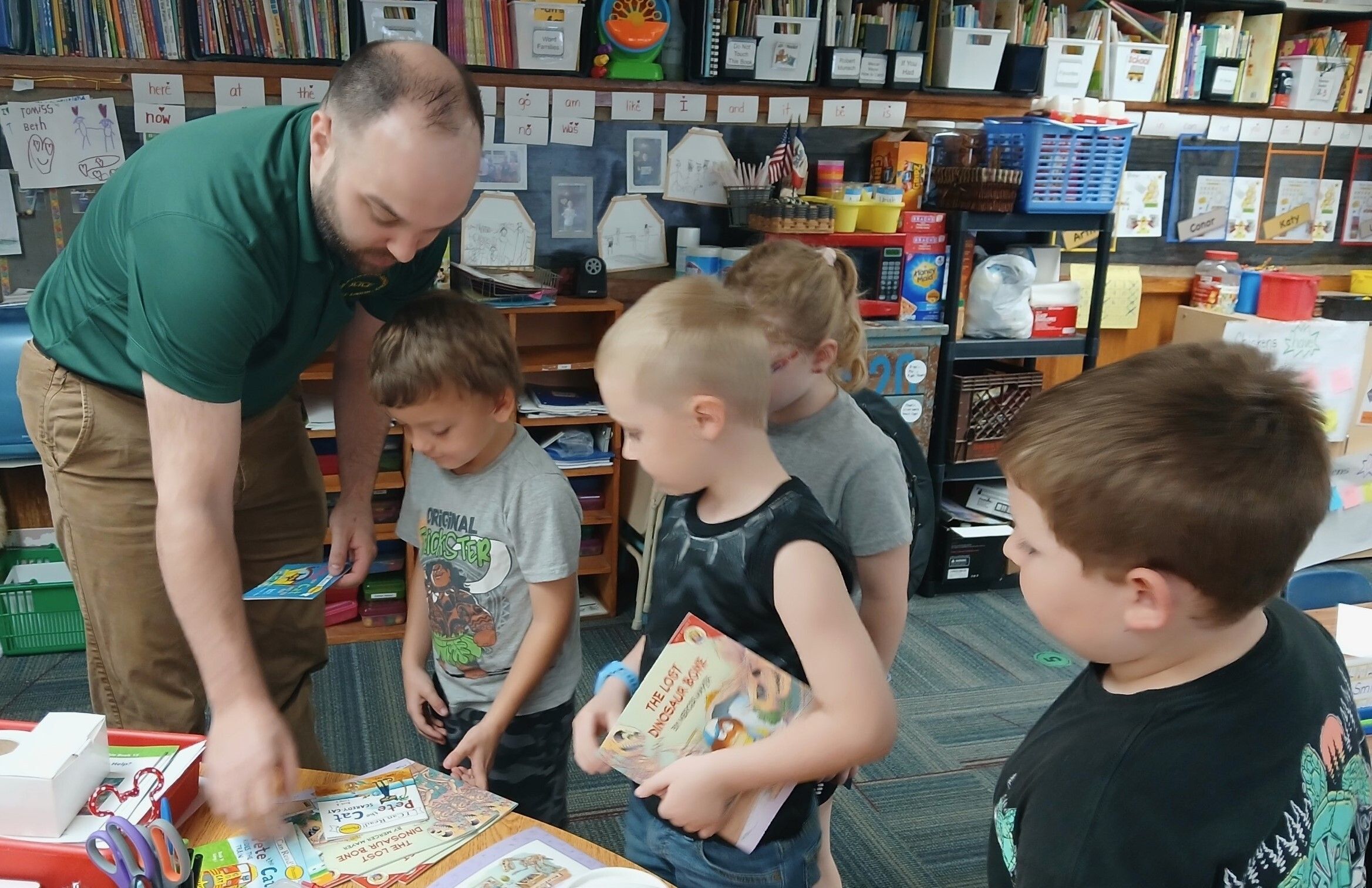 Austin Giving Books to Diagonal Kindergarteners!