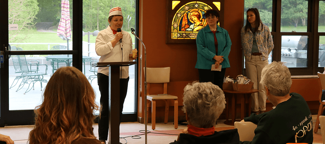 Sister Val recites a poem about ice cream...and then she distributed cake-filled and sprinkle-topped ice cream cones.