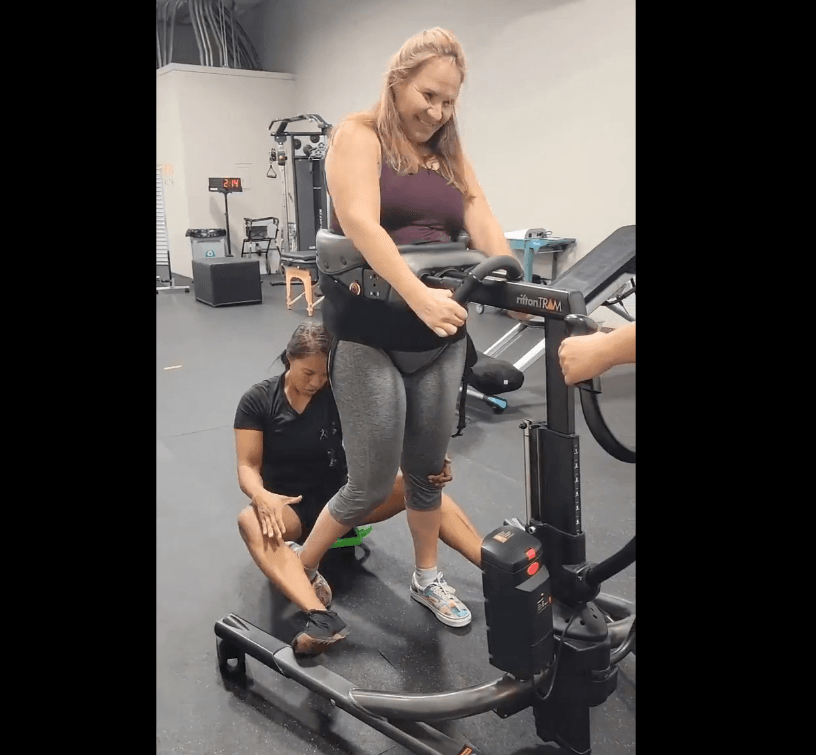 Woman on treadmill walking