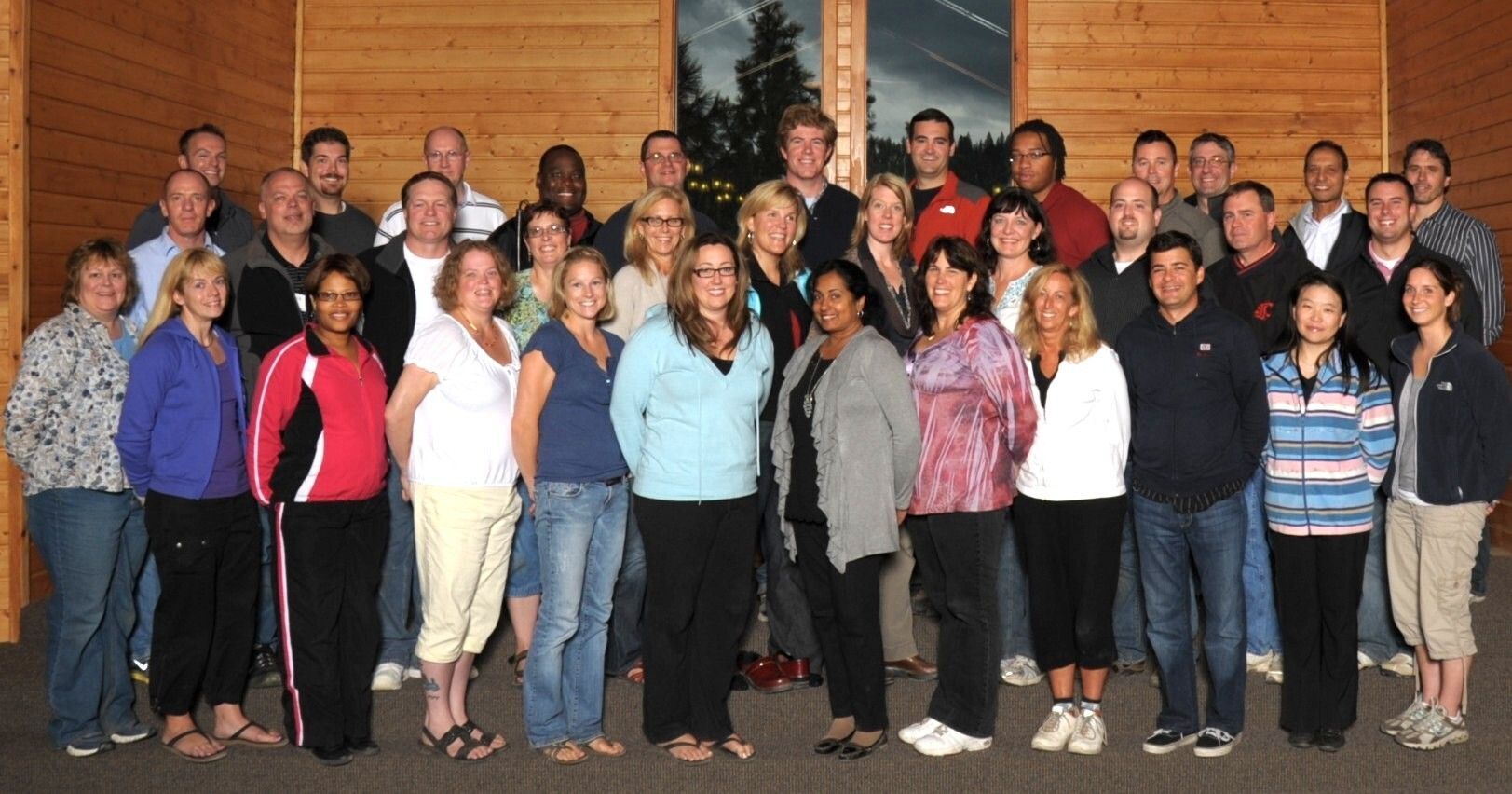 A group of people posing for a group photo