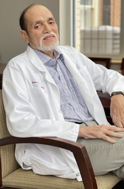 Dr. Rene Latoni