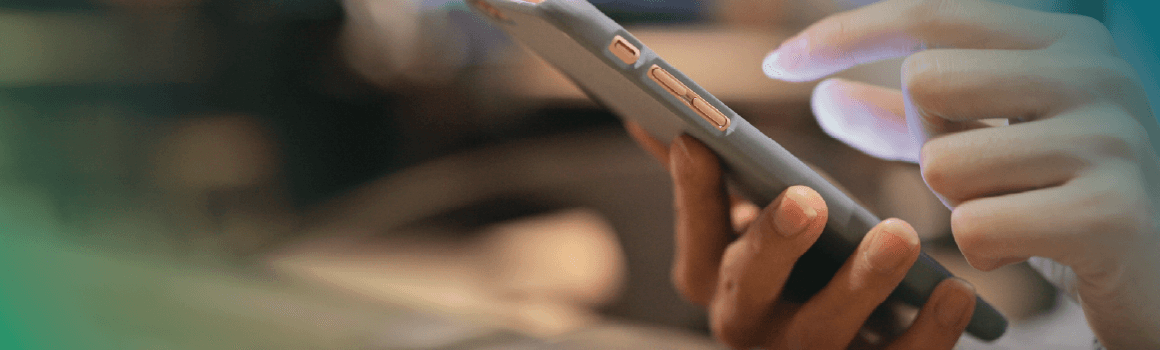 person typing on cell phone