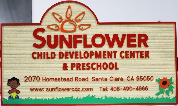FA15942 - Carved Raised Relief and Sandblasted Wood Grain HDU Sign entrance  sign for the Sunflower Child Development Center and Preschool, with a Boy and a Sunflower as Artwork