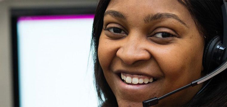 Woman smiling with headset on
