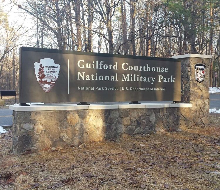 G16025 -  Entrance Sign for the  Guilford Courthouse National Military Park with Carved Colonial Drum