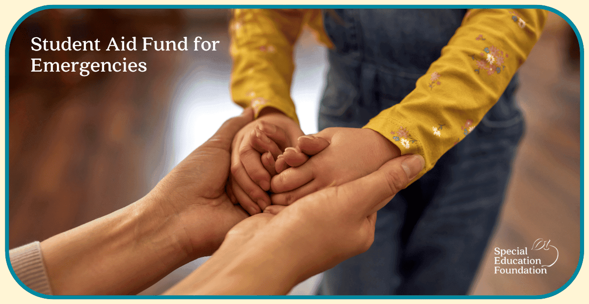 adult hands holding a child's hands