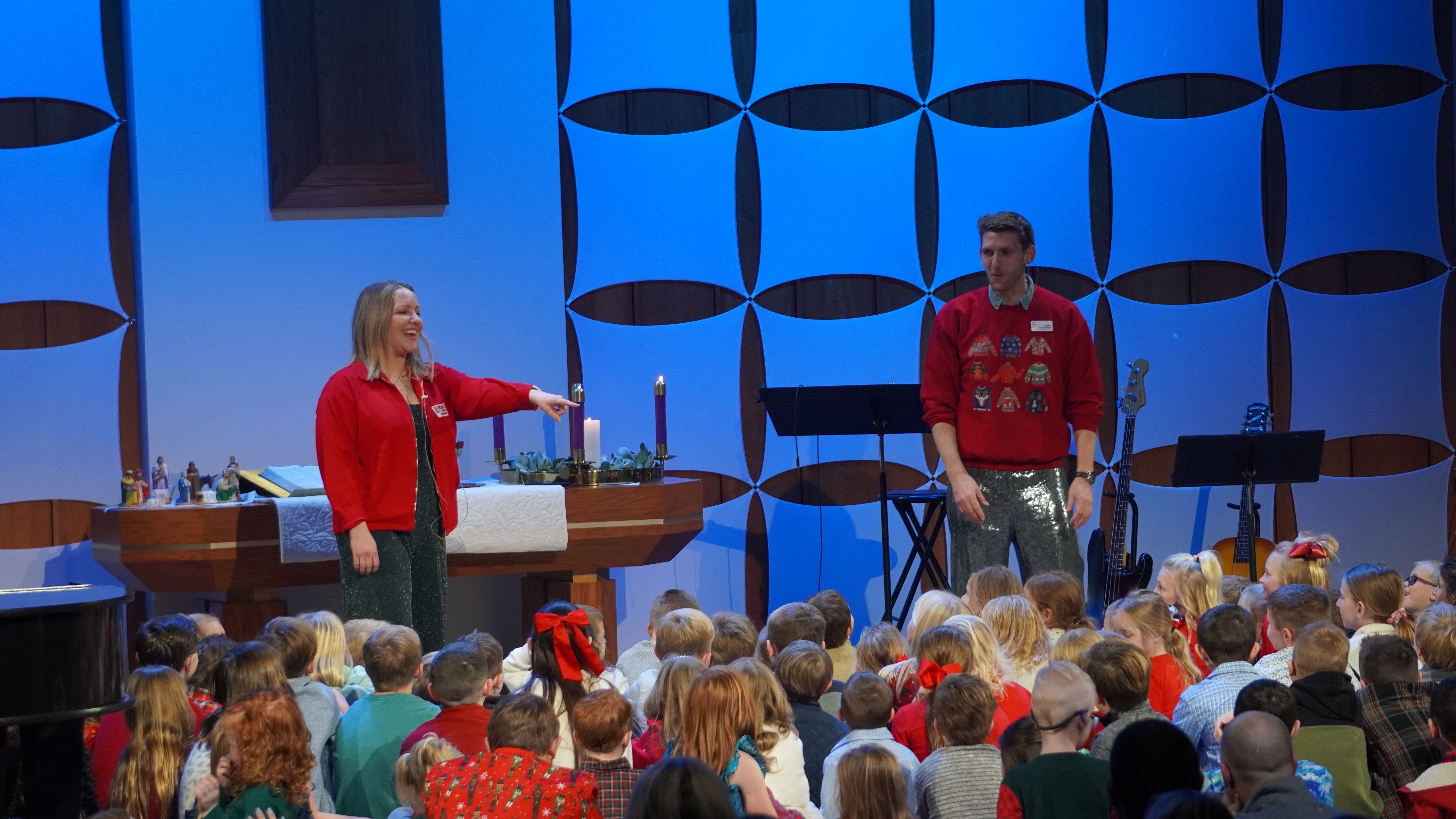 Children at the altar listening to children's message.