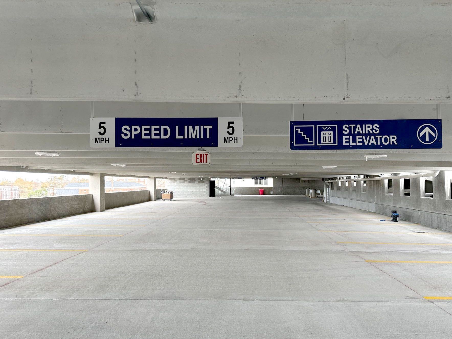 Augusta University Parking Garage speed limit sign and traffic direction sign