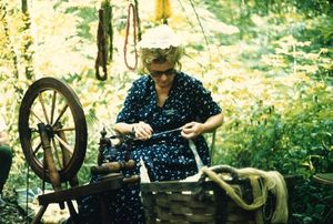 Betty Haupt demonstrates spinning flax at Mountain Craft Days