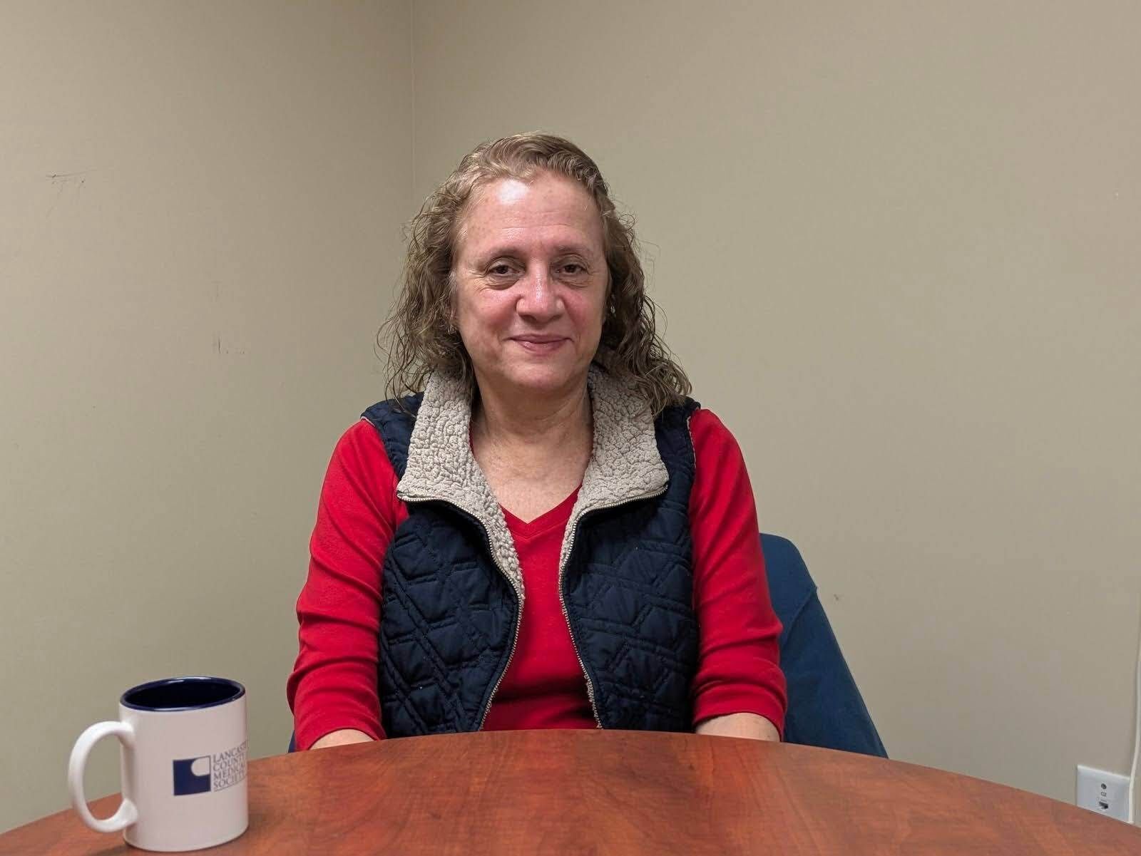 Alix Gomez, the Community Assistant Manager at El Centro de las Américas