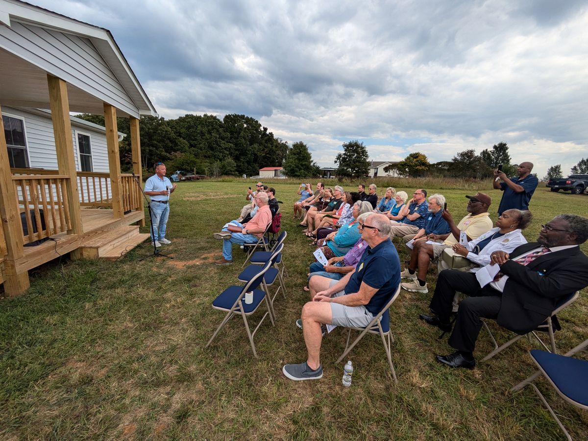 Sam speaking at Kylene's home dedication