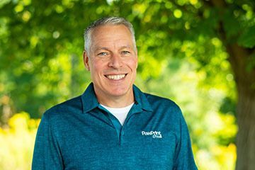 head shot portrait of Paw Print owner Tim Fortune