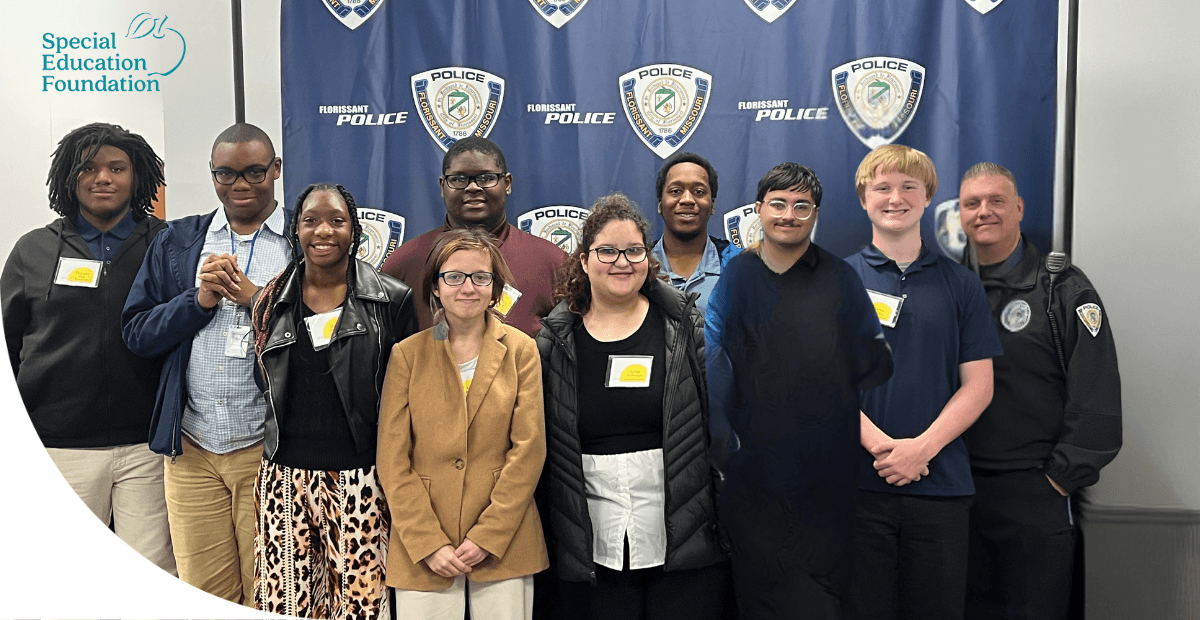 students standing next to a police officer 