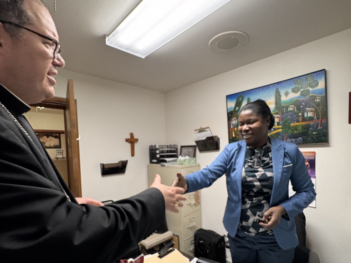Bishop Manuel Visits our Fort Pierce Office