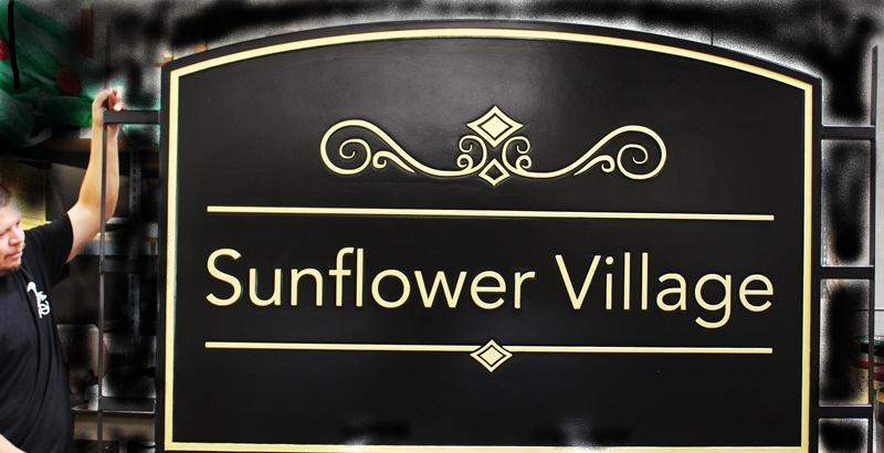 K20425 - Carved 2.5-D Raised Relief High-Density-Urethane (HDU)  Residential Community Sign for "Sunflower Village".