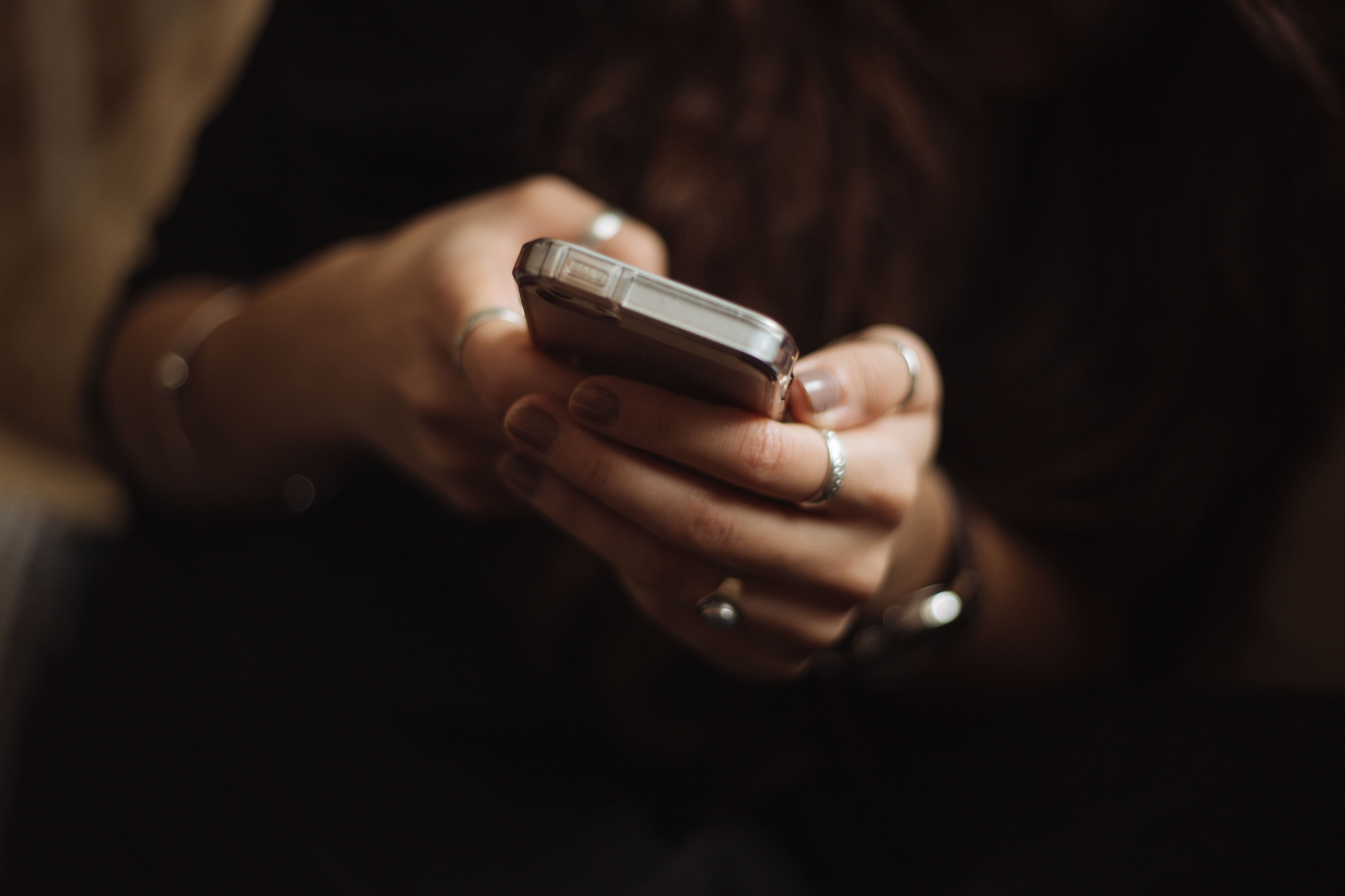 image of person holding phone