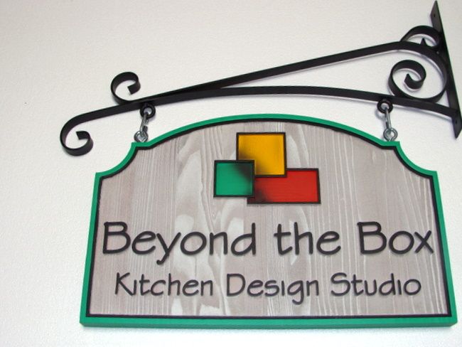 SA28405 - Carved Wood Sign for Kitchen Design Studio, Hung from Decorative Wrought Iron Scroll Bracket 