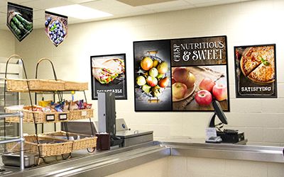 Large food murals in school café with wood look, custom signs, nutrition education