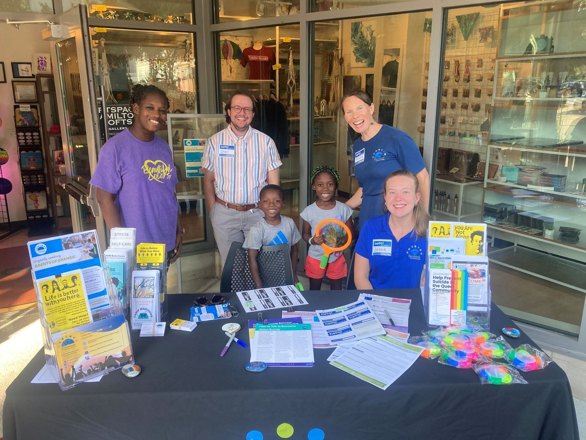 Envision Partnerships staff at an information booth for Step Into Your Child's Shoes 2022