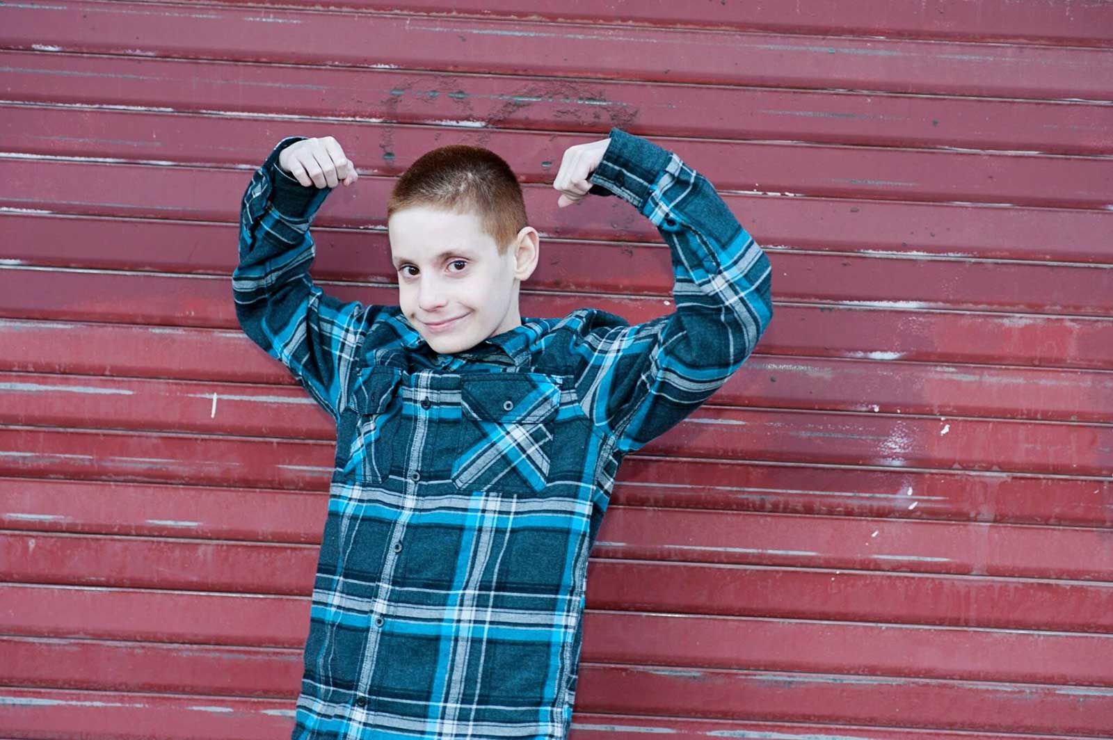 Pediatric PSC patients often surprise their parents with their reliance. This young boy is flexing his muscles, and showing that he may have PSC, but PSC doesn't have him! 