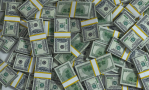 A picture of stacks of money.