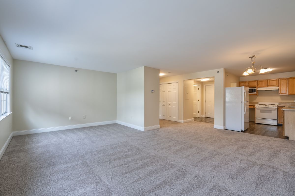 Berkshire view of kitchen and entry from living area