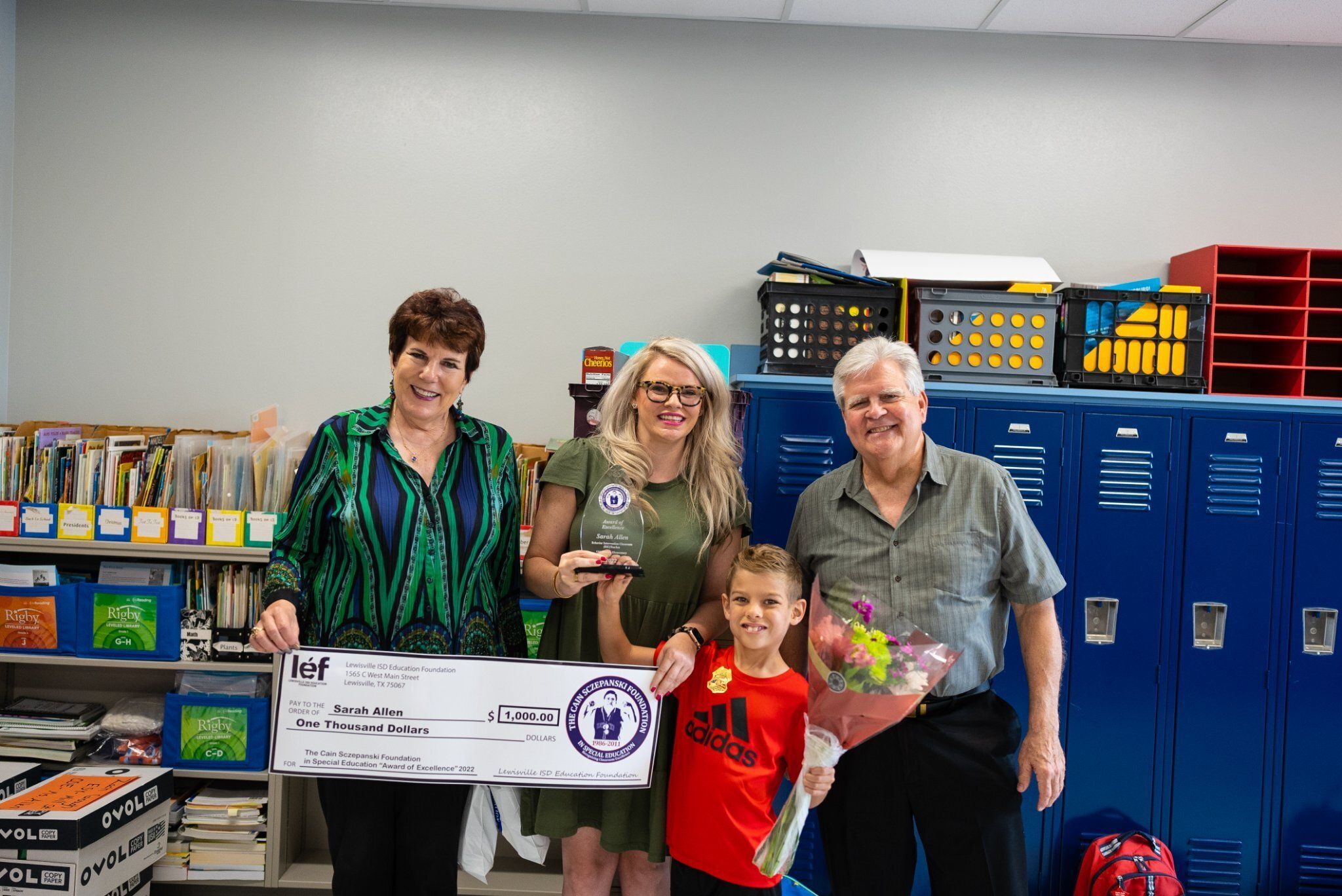 Sarah Allen, one of the six recipients of the Cain Sczepanski Award, posing for a picture with Bill and Carolyn Sczepanski.