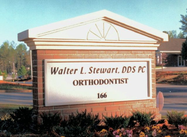 BA11512 – Brick Facade Peaked Roof Monument Sign for Orthodontist Office