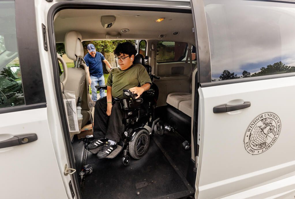 Unhoused student living at Caritas Center in wheelchair