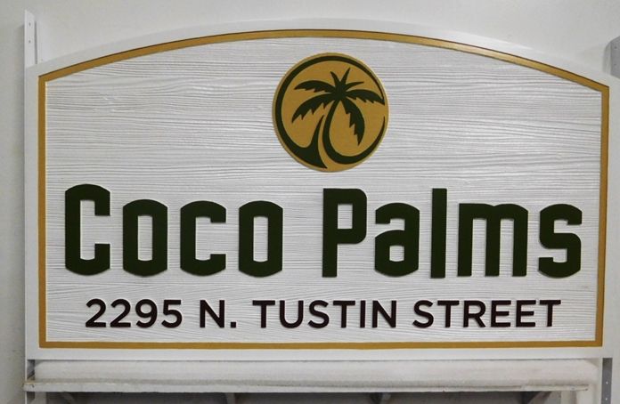 K20327 - Carved HDU Entrance Sign  for the "Coco Palms" Apartments,  with Wood Grain Sandblasted Background