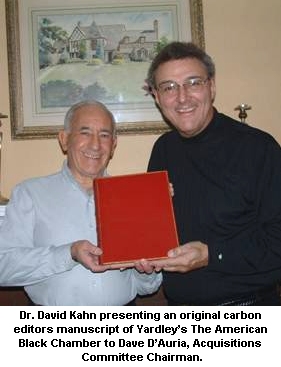 Dr. David Kahn presents cryptologic items, artifacts, and memorabilia to the National Cryptologic Museum Foundation. He is pictured here with David D'Auria.
