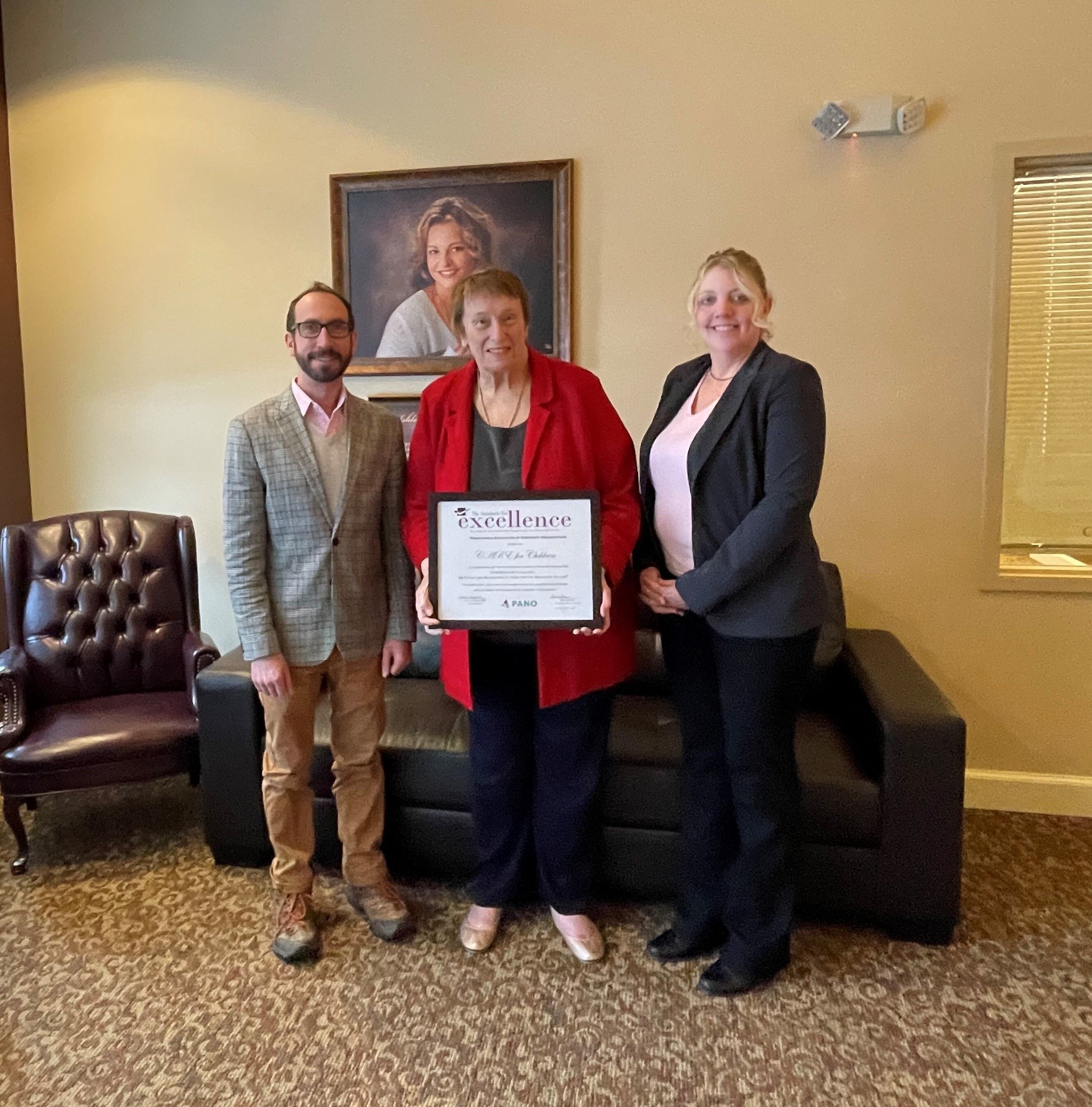 CARE Board Members Tyler R. Hannah and Karen Gelston, along with CARE Executive Director, Tina M. Martin