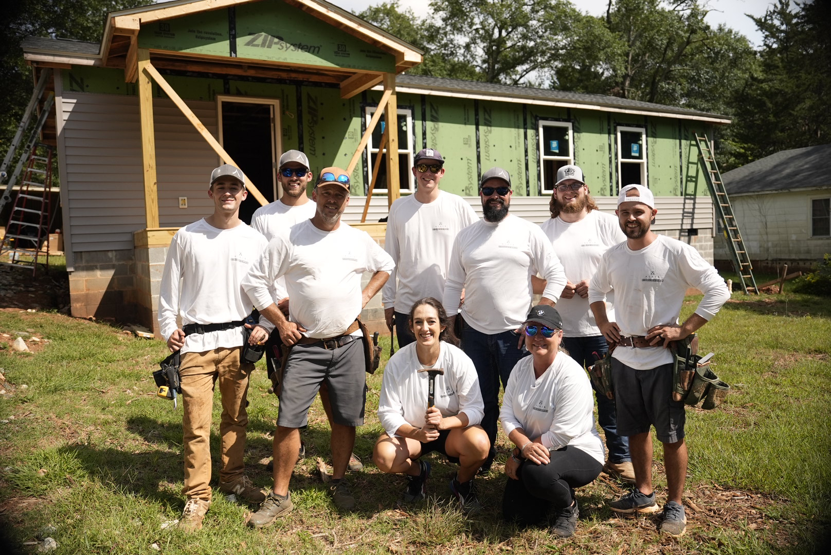 Alair Homes volunteers assisted Pickens County Habitat for Humanity on Ryan Street, installing insulation and siding on the home.
