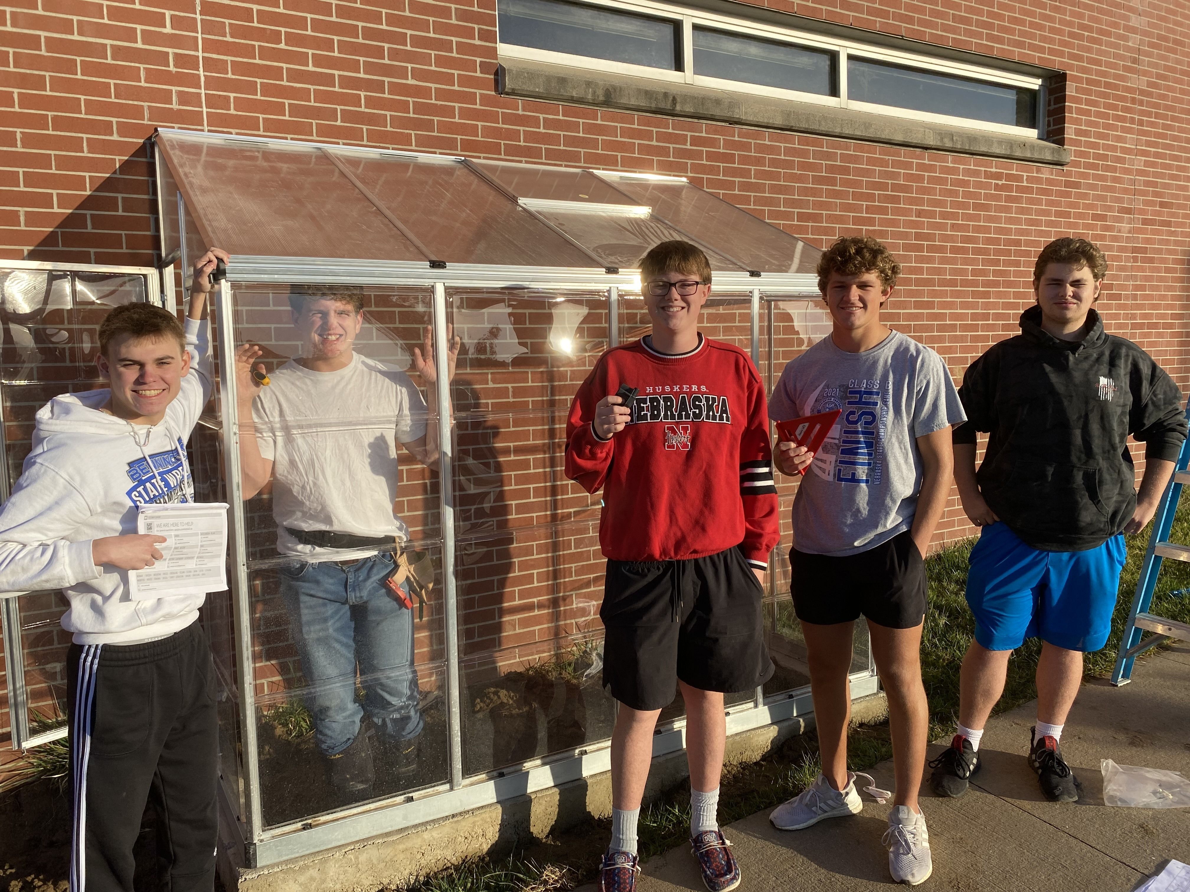 Bennington High School Building Construction students completed construction of greenhouses.