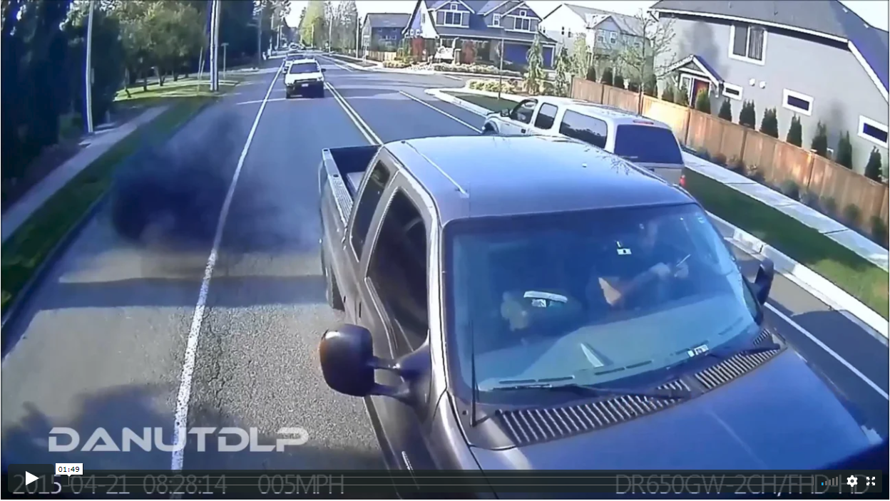 Distracted Driver Using Phone Hits Back of Van
