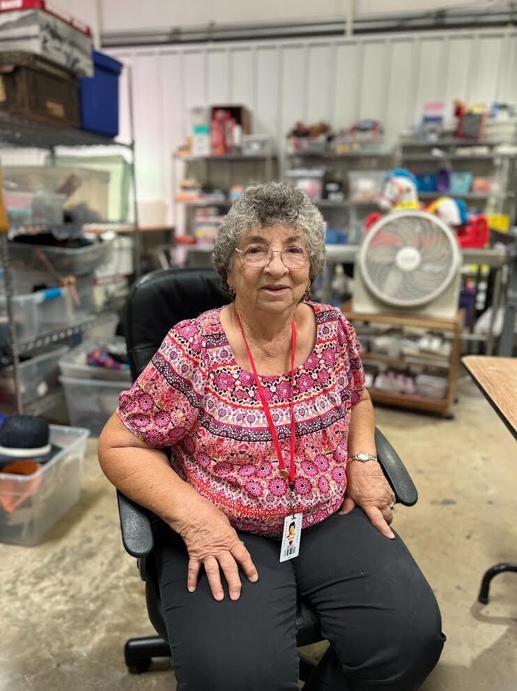 Betty has been working to sort, inspect, price, and put out shoes, purses, and hats in the stores. While I’m sure she has worn many hats throughout her life, with such commitment to The Caring Place, one “hat” has undoubtedly become and still is hats.